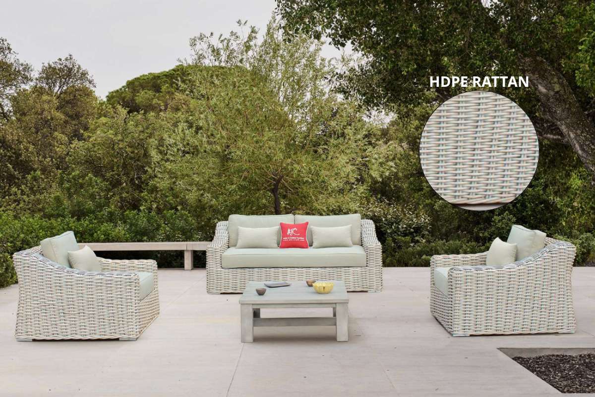 Outdoor 4-seater sofa set made from HDPE rattan, displayed in a lush tropical garden with a close-up of the wicker texture.
