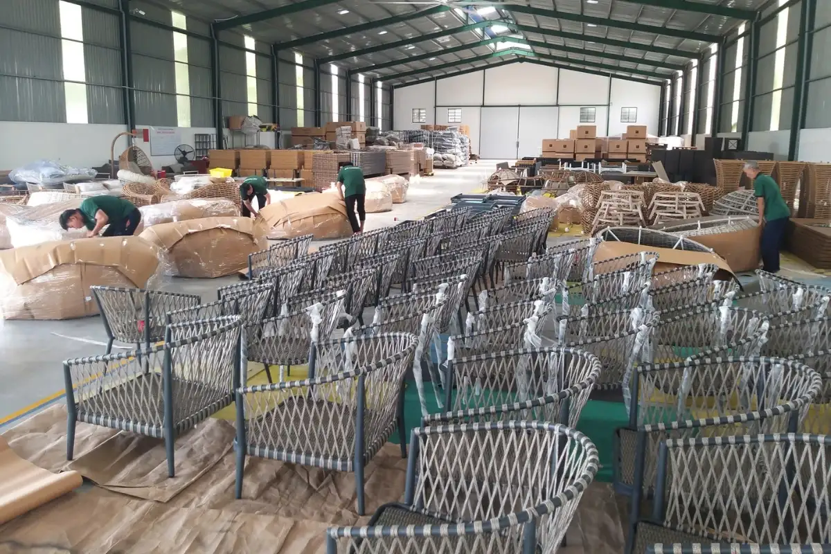 Staff inspecting products before packaging and delivery to customers