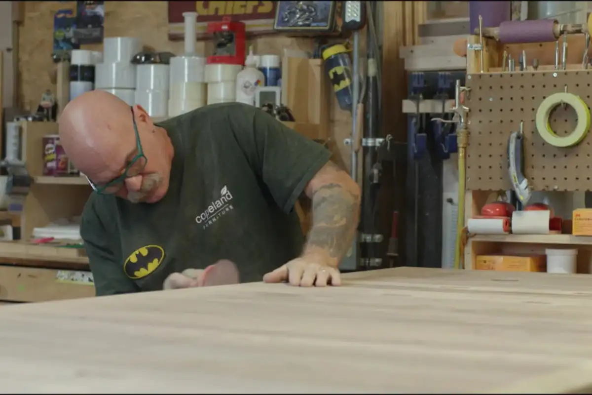 Skilled craftsmen of Vermont Woods Studios finishing a product