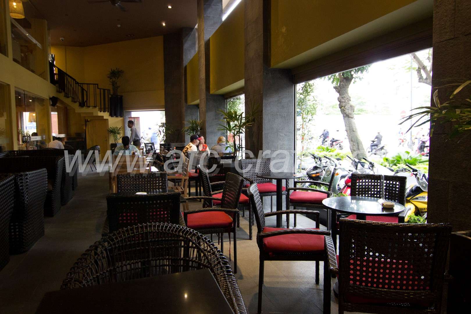 Highlands Coffee indoor area wicker chairs