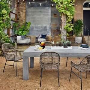 a-wood-table-with-wicker-chairs-300x300.jpg