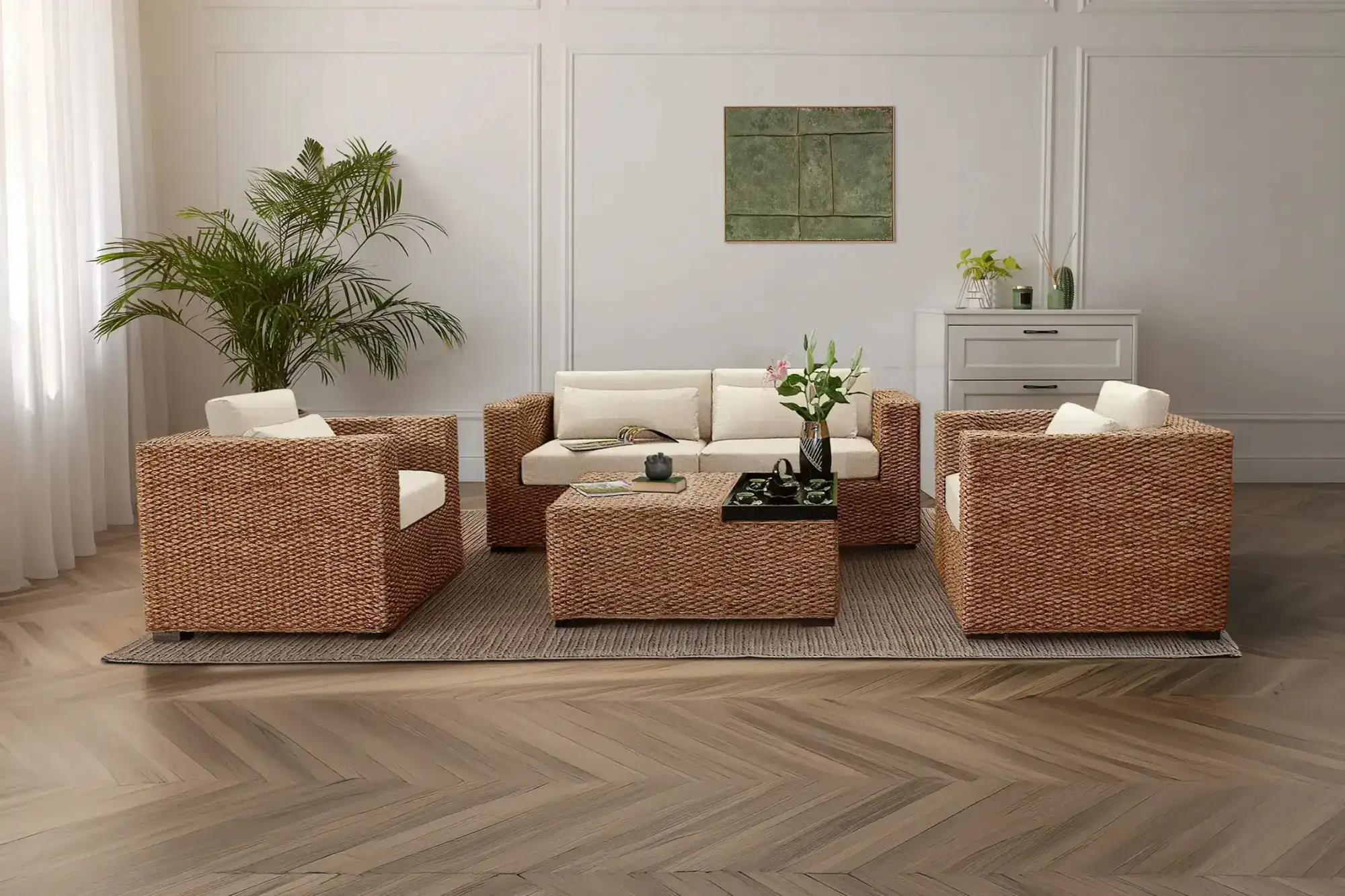 NATURA water hyacinth sofa set with clean square lines and thick cushions, arranged in a calm and balanced indoor living space.