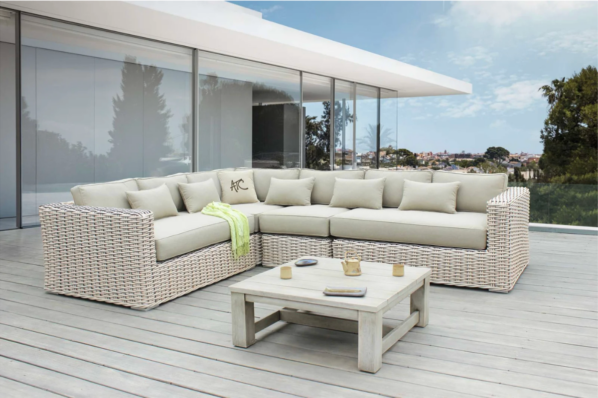 High-end outdoor furniture set featuring a spacious corner sofa and coffee table for modern garden living