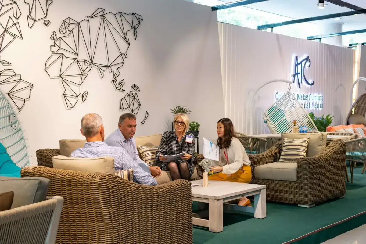 ATC Furniture meeting with international buyers at an outdoor furniture exhibition