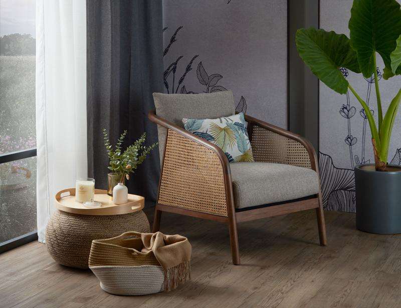 Only with a single Wicker chair already created a relaxing vibe in house corner