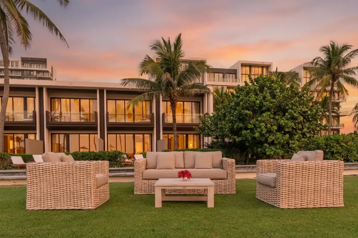 Commercial outdoor sofa set made with UV-resistant HDPE synthetic wicker.