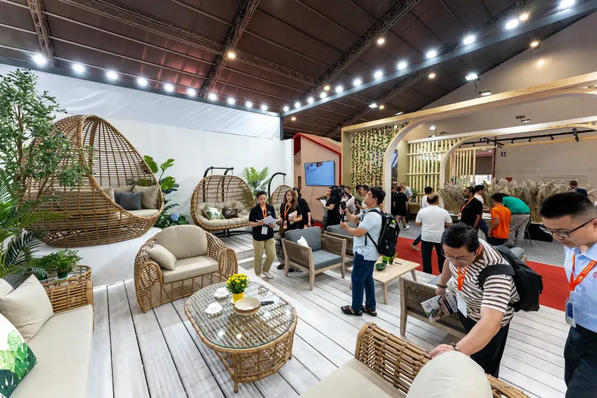 Professional buyers sourcing outdoor furniture at an international furniture trade show