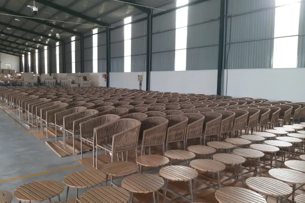 Large-volume outdoor furniture production arranged inside a manufacturing facility