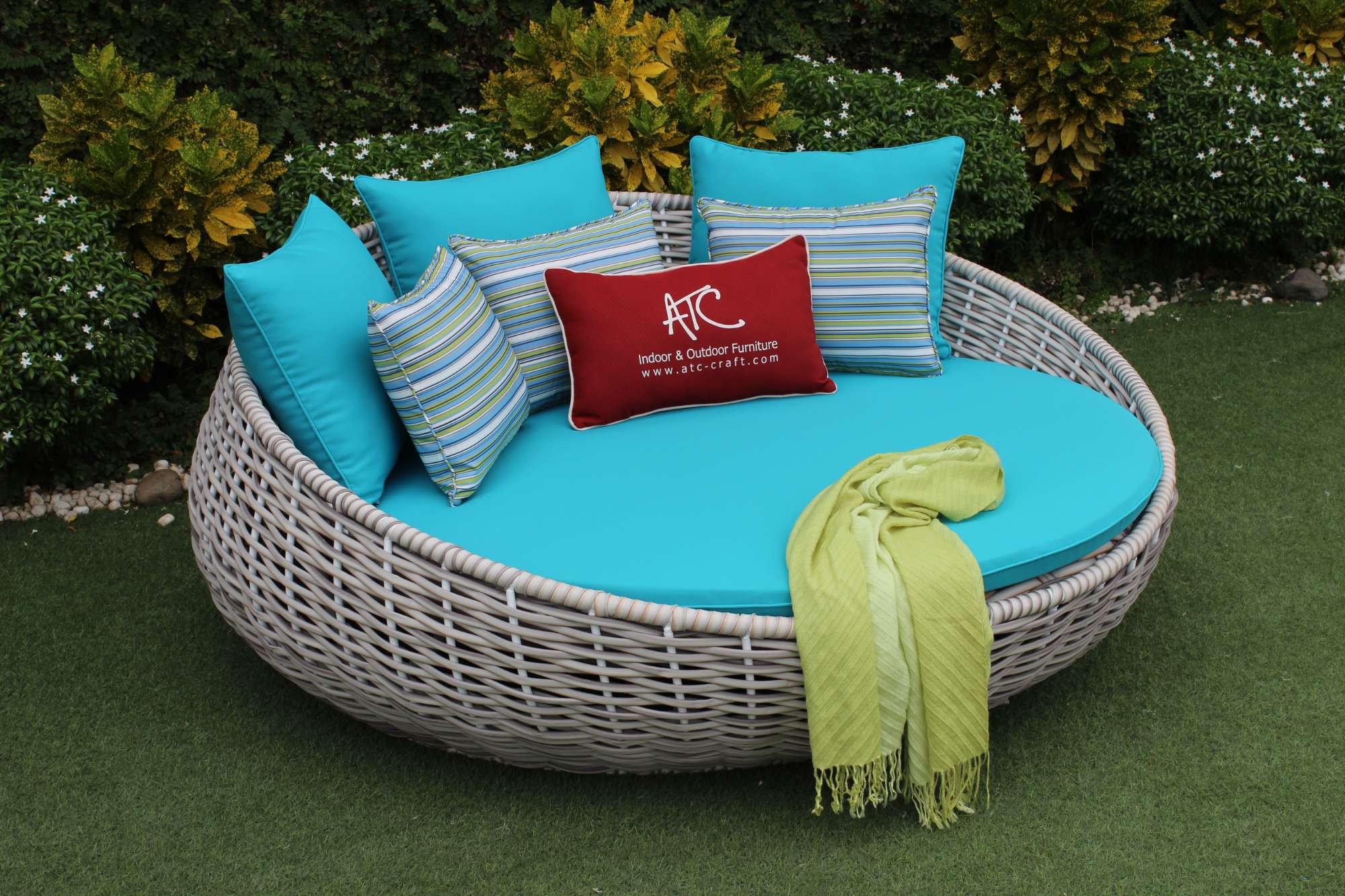 Ideal outdoor lounging with blue synthetic wicker furniture