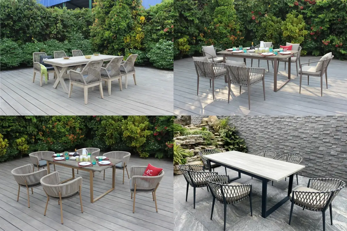 Dining table with grey frame and woven rattan chairs beside a stone wall and waterfall feature