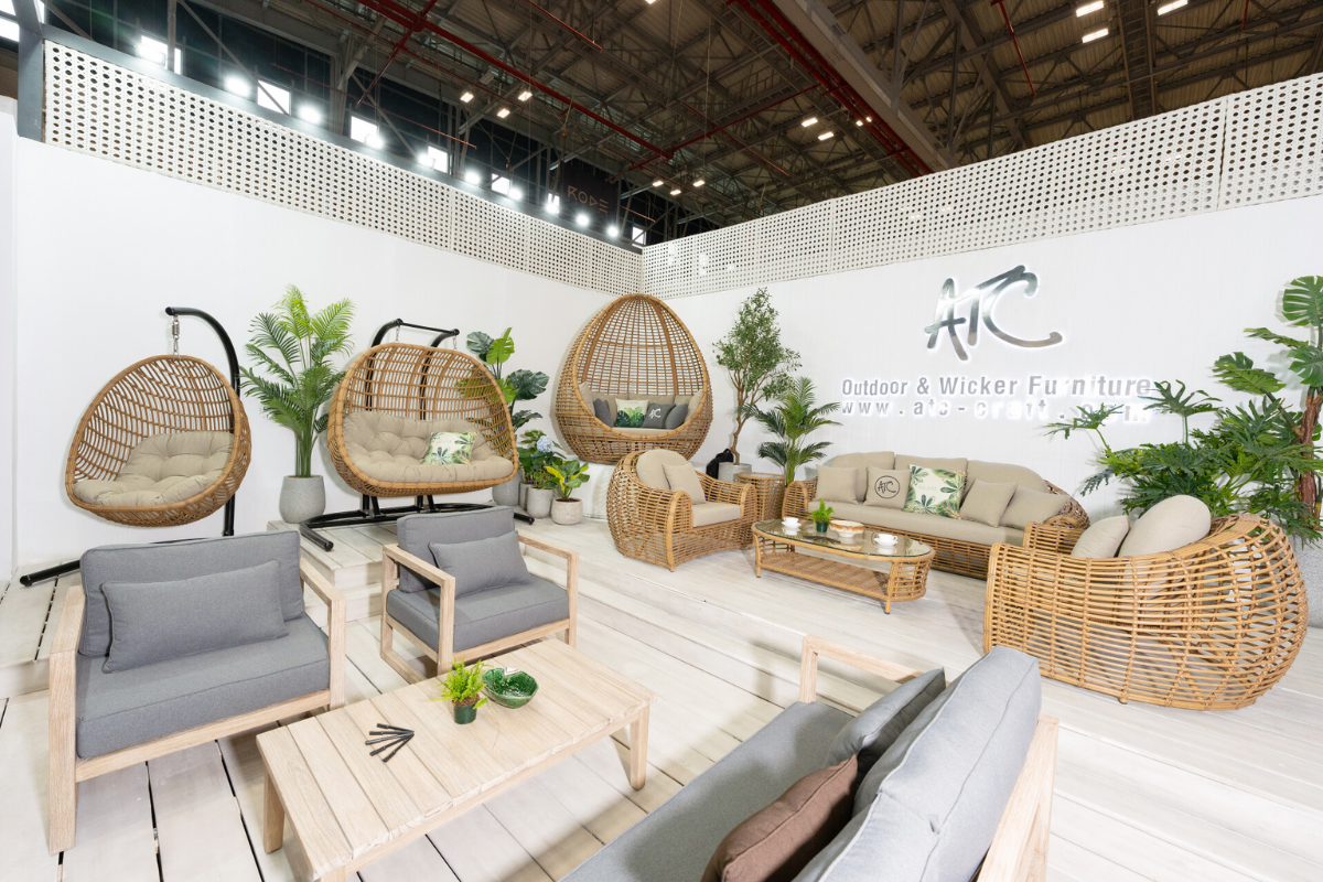 Rattan outdoor furniture booth at HAWA Expo displaying sofas lounge chairs and garden sets
