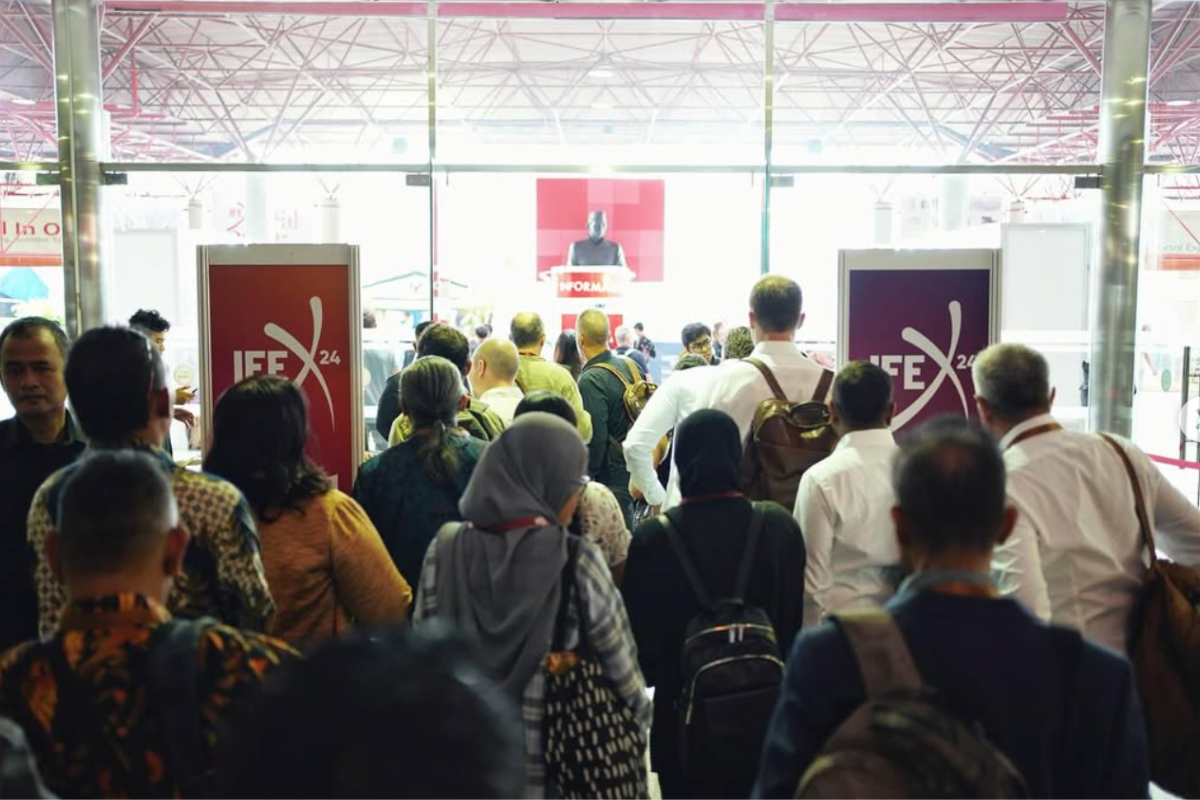 Professional visitors entering IFEX exhibition hall including buyers importers and designers 
