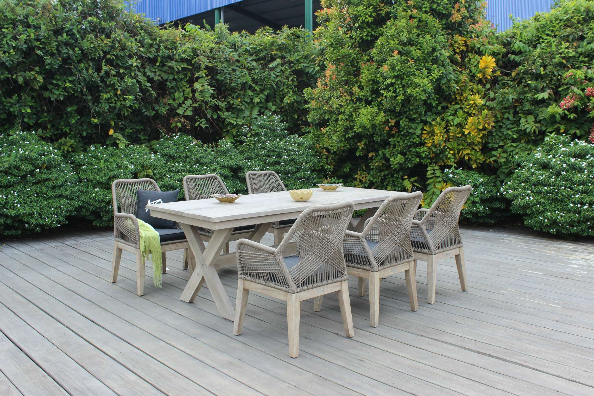 The spacious table and comfortable chairs offer ample room for gatherings, while the weather-resistant materials ensure long-lasting durability.