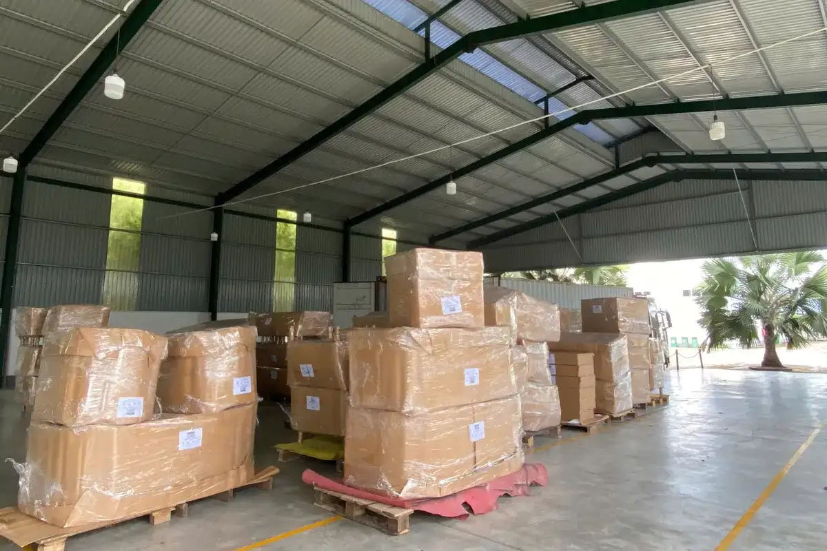 Stacked export-ready furniture cartons in a Quy Nhon warehouse, highlighting the region’s role as a trusted hub for global furniture sourcing.