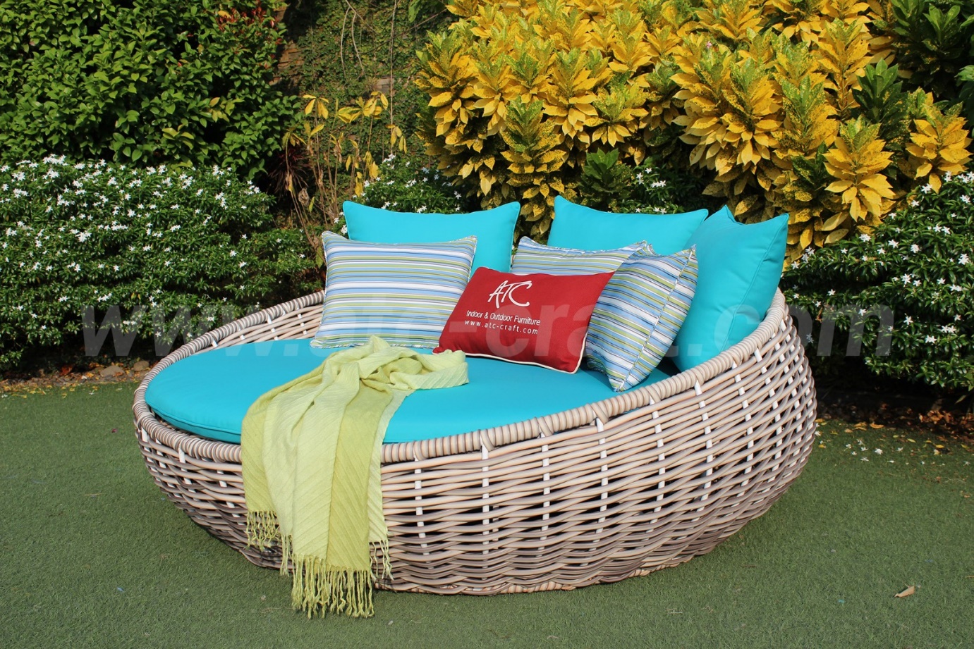 Comfortable wicker sunbed for sunroom or outdoor use