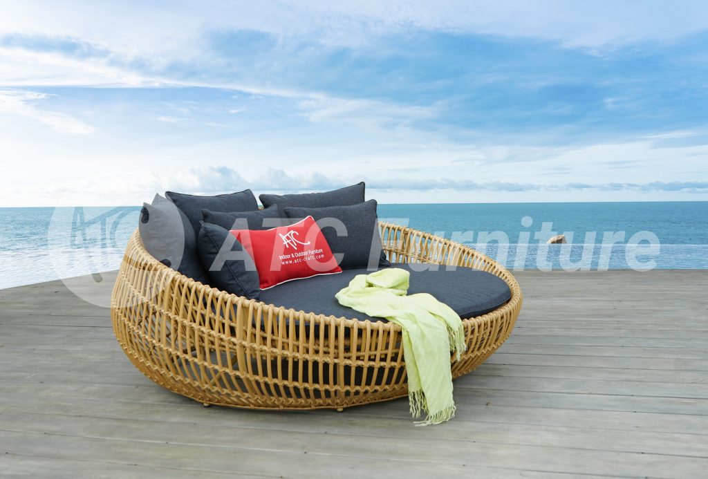 Outdoor round sunbed with poly bamboo wicker