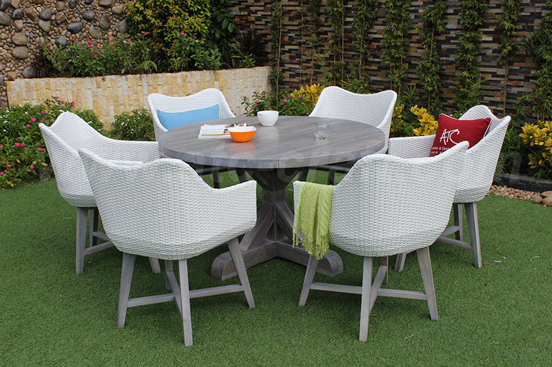 Round dining set with six resin rattan dining chairs