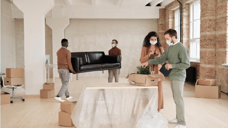 Furniture quality inspection taking place in a loft-style office